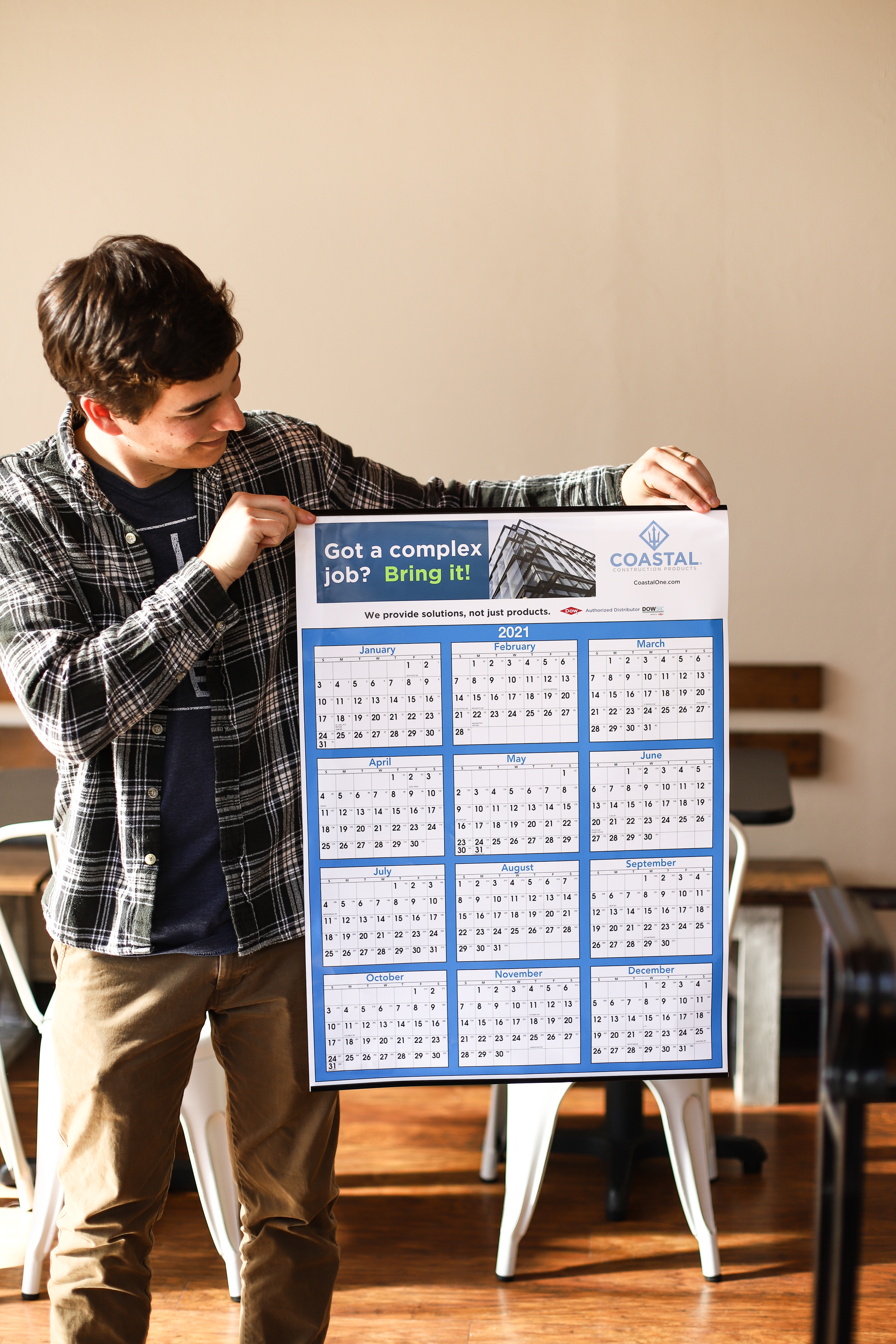 https://www.calendarcompany.com/mm5/graphics/00000001/1/A428-Guy%20Standing%20Holding%20Calendar.jpg